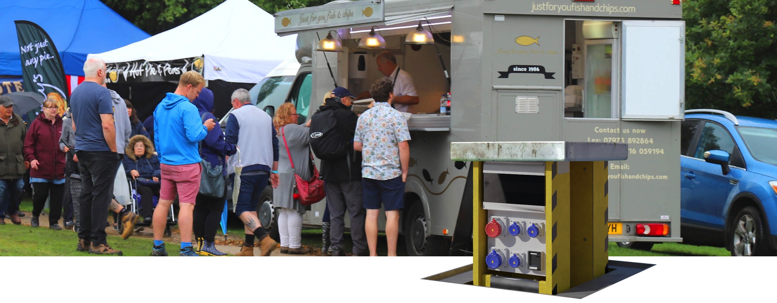 Pop Up Power Supplies Ltd Pop Up unit next to a food van